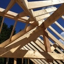 Ossature bois avec noue de charpente et ferme apparente