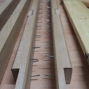 2 rangées de clous pour tendre le tissu