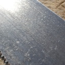 Marque "Peugeot frères [lion sur une flèche] à garantie." La marque est imprimée une deuxième fois de ce côté de la lame, à quelque distance de la première.