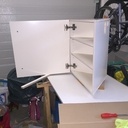 Meuble sous vasque d'angle