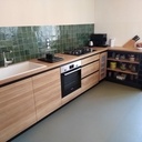 Cuisine sur mesure en chêne et MDF teinté noir