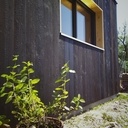 Petit agrandissement en bardage bois brulé