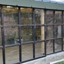 Double baie vitrée coulissante en bois