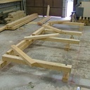 Une charpente de terrasse couverte en mélèze