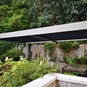 Pergola bioclimatique ossature bois.