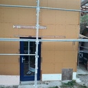 Marquise sur facade isolée par l'exterieur et enduite.