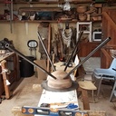 Table en noyer / verre trempé / acier