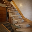 Escalier quart tournant limon central et garde corps déstructuré