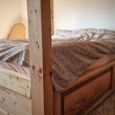 Lit baldaquin en vieux bois