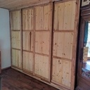 Placard portes coulissantes tout en massif