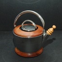 Habillage d'une théière en métal