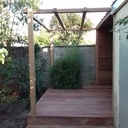 Petite terrasse pergola abris à bois