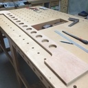 J'aspire à moins de poussière dans l'atelier.