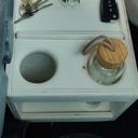 Meuble vide-poche / porte-gourdes pour van aménagé