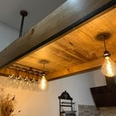 Toit d'îlot en chêne et châtaignier, touches de métal.