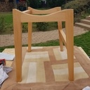 Tabouret à l'assise galbée