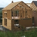 Ossature bois avec noue de charpente et ferme apparente