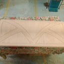 Cache tuyaux cintré