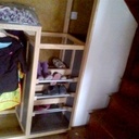 Meuble de rangement sous escalier réalisé en frene