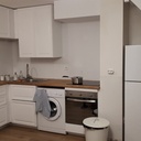 Cuisine en frêne brossé, laqué blanc et chêne