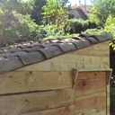 Abri à outils à couverture traditionnelle