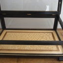 Une vitrine en chêne ébonisé.