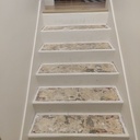 Habillage escalier béton en chêne et son claustra