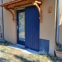 Marquise sur facade isolée par l'exterieur et enduite.