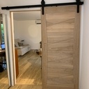 Porte coulissante en chêne