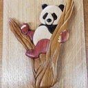 Tableau d'un panda en intarsia