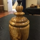 Petite boite en Olivier avec un petit collage d'ébène sur le haut