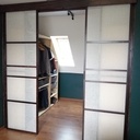 Cloison coulissante pour dressing ouvert