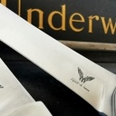 Couteaux pliants ressort intégré aux platines