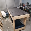 Un établi type MFT de 1,60m x 0,7m x 0,90m (hauteur) avec un mur en French Cleat