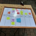 Tableau blanc en hardboard et encadrement en sapin