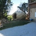 couverture avec des bardages en mélèze qui vient recouvrir le pare pluie. Ce n'est pas visible sur la photo mais il y a des tasseaux entre le pare-pluie et les bardages