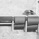 Support pour rouleaux de papier à poncer