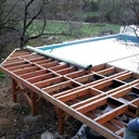 Ensemble porteur d'une terrasse avec bardages.