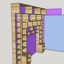 Bibliothèque autour d'un lit