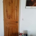 Porte en place dans un cadre existant