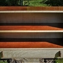 Vitrine pour encres de stylos plumes, avec un rangement pour les stylos.