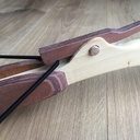 Arbalète à bouchon