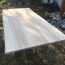 Plateau de table et sa finition faite par son propriétaire