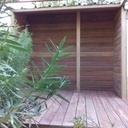 Petite terrasse pergola abris à bois