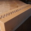 Manche d'épée laminé