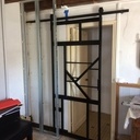 Porte bois métal coulissante