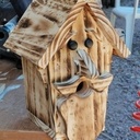 Nichoirs personnages en bois brulé