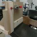 Poussoir pièces debout pour toupie