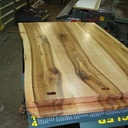 Table de salon en noyer (très) massif, et tube acier.