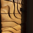 Meuble de bureau, façade en chêne sculptée.